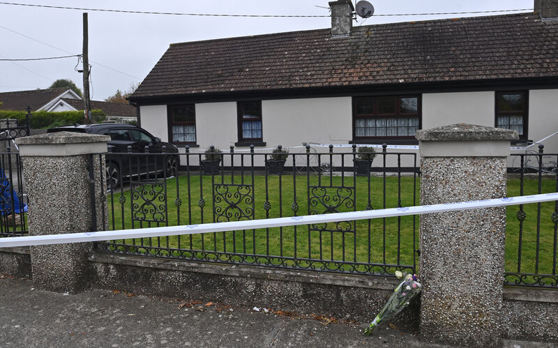  A bouquet of flowers at the house on Rockview Terrace, Doneraile, Co Cork, where the body of postman Barry Daly was found dead. Picture: Dan Linehan