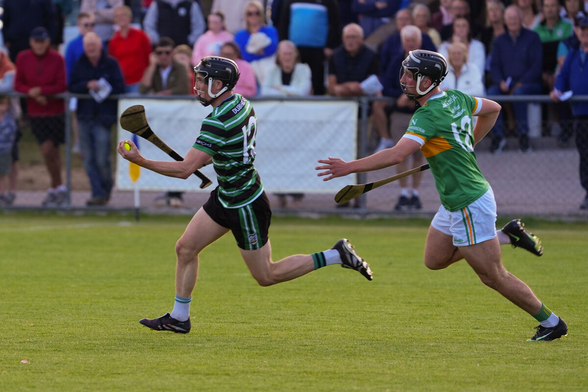 Douglas’ Mark O'Brien sails past Newtownshandrum’s Turlough O’Neill. Picture: Noel Sweeney