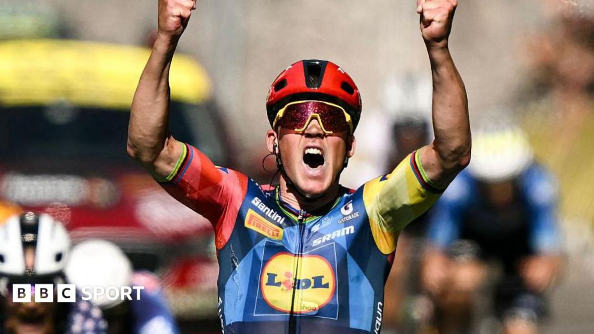 Torstein Traeen celebrates on the podium with the overall leader's yellow jersey after the fourth stage of the 113th edition of the Tour de France