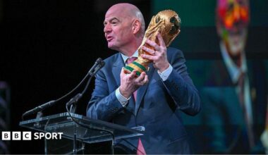FIFA president Gianni Infantino holds the FIFA World Cup trophy