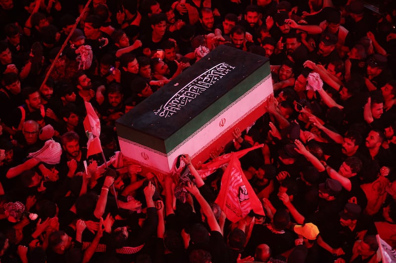 Mourners take part in the funeral procession of Iran's late supreme leader Ayatollah Ali Khamenei at Imam Hussein Shrine in Karbala, Iraq. Photograph:  Ahmad Al-Rubaye/AFP via Getty Images