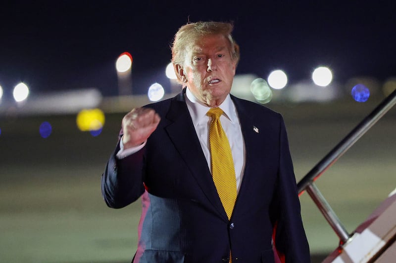 US president Donald Trump at Royal Air Force Mildenhall in England where he boarded a flight back to Washington after attending the Nato summit in Turkey. Photograph:  Win McNamee/Getty Images