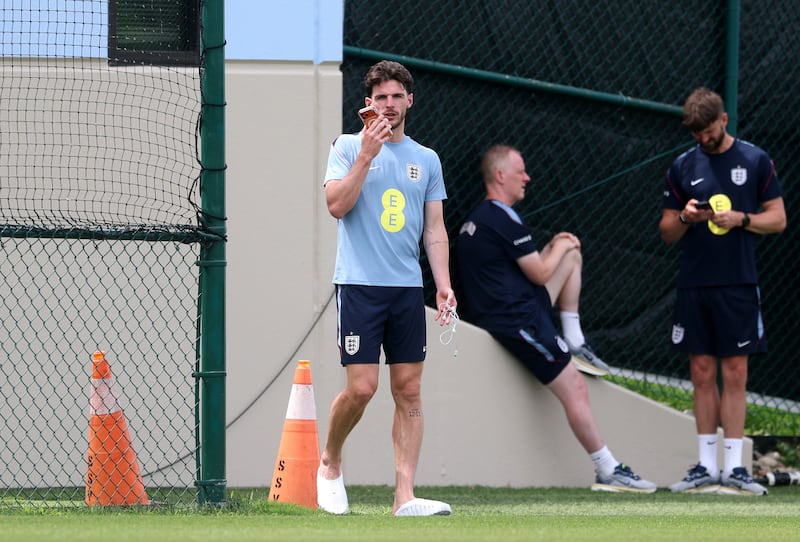 Declan Rice of England uses his phone during a training session in Kansas City. Photograph: Richard Pelham/Getty