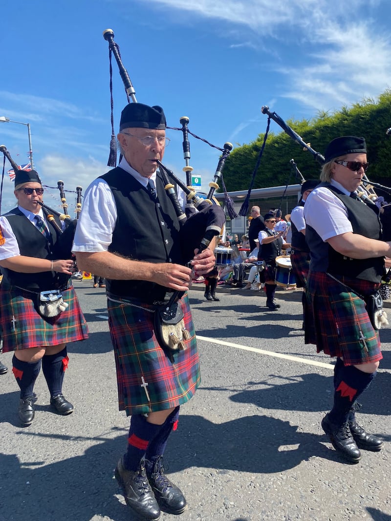 Participants in the Orange Order parade in Royal Hillsborough, Co Down. Photo: Jonathan McCambridge/PA