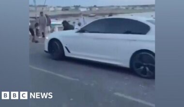 Man charged over incident where car rams into crowd - BBC