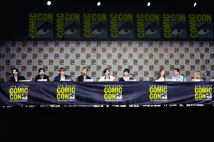Members of K-pop boy band ENHYPEN speak during the panel session in Ballroom 20 of the San Diego Convention Center in San Diego, Calif., Thursday (local time). The group joined 'Twilight' director Catherine Hardwicke and actors Ashley Greene and Peter Facinelli to discuss the vampire genre. Courtesy of HYBE