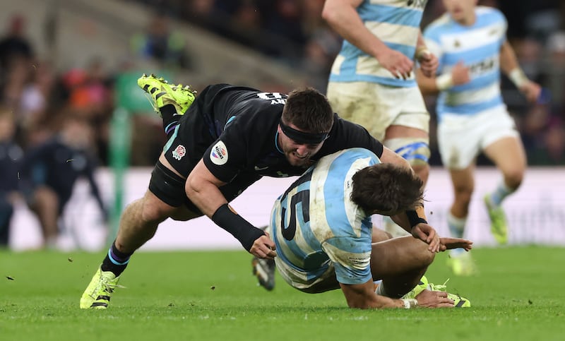 Juan Cruz Mallia of Argentina is tackled by England's Tom Curry. Photograph: David Rogers/Getty