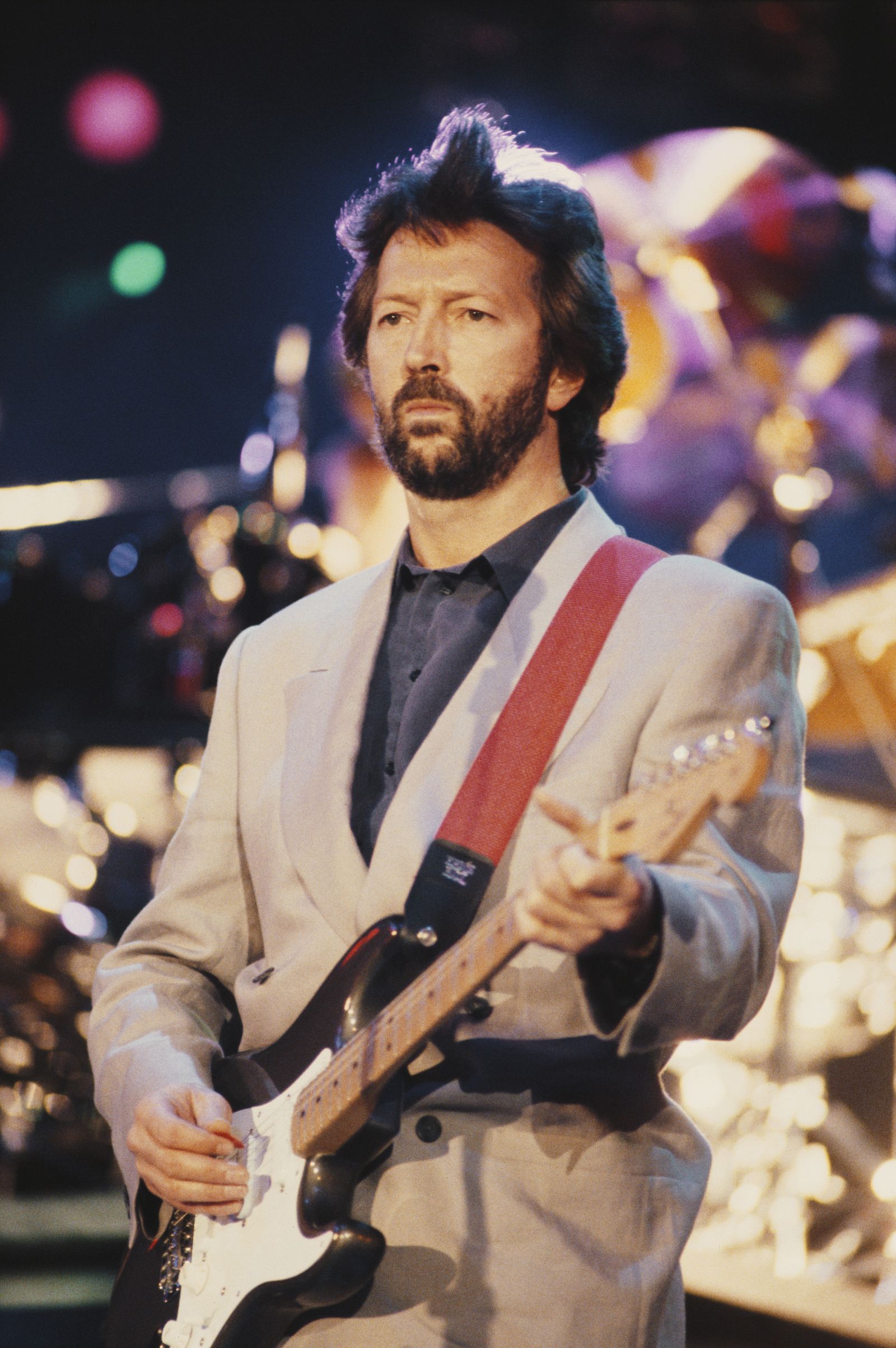 Image may contain Eric Clapton Performer Person Solo Performance Adult Guitar Musical Instrument and Guitarist