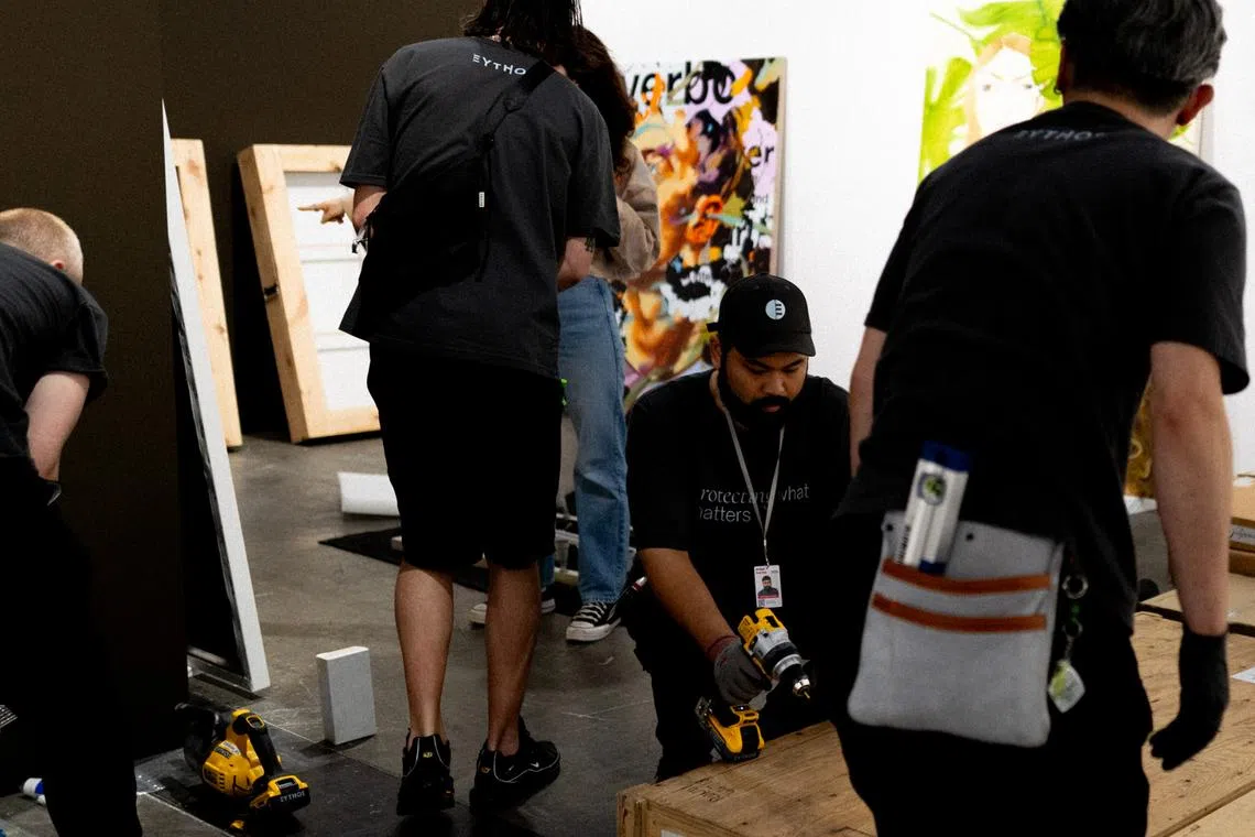 The Eythos team mid-installation at Art Basel Hong Kong 2026.