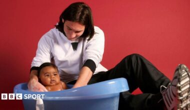 Lionel Messi cradles a baby Lamine Yamal in a bath in the away dressing room at Barcelona's Camp Nou stadium in 2007