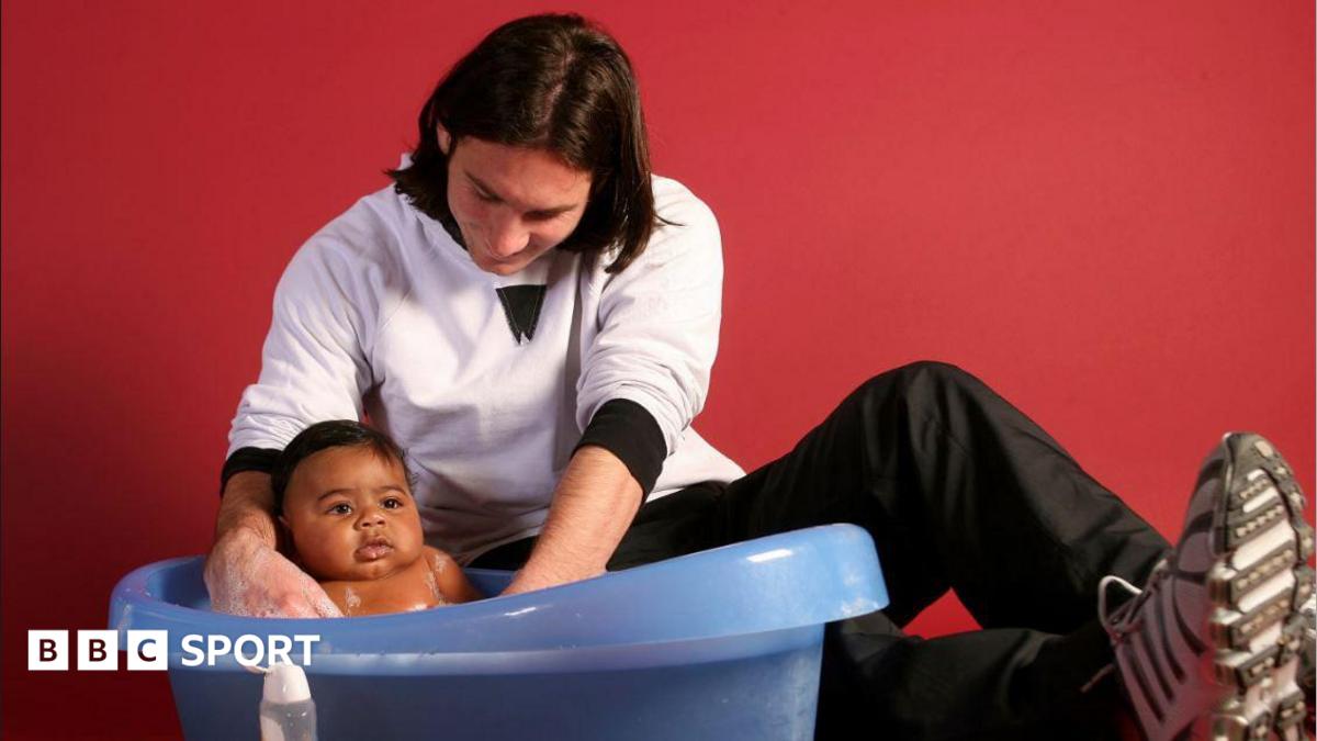 Lionel Messi cradles a baby Lamine Yamal in a bath in the away dressing room at Barcelona's Camp Nou stadium in 2007