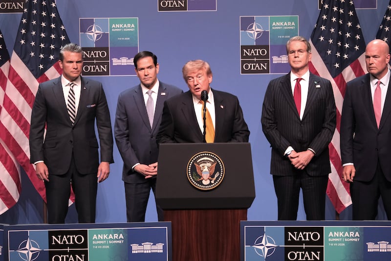 US president Donald Trump speaks to the media at a news conference at the Nato summit in Ankara on Wednesday with several members of his administration nearby. Photograph: Kerem Uzel/Bloomberg