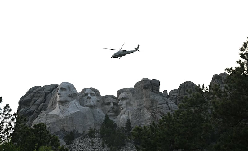 A helicopter flies above Mount Rushmore National Memorial during a July 4 event attended by US president Donald Trump in Keystone, South Dakota, on July 3, 2026. Photograph: Mandel Ngan/AFP via Getty Images