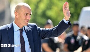 Zinedine Zidane waves to crowds after being unveiled as France manager
