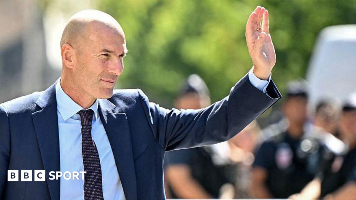 Zinedine Zidane waves to crowds after being unveiled as France manager
