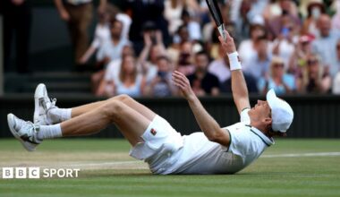 Jannik Sinner falls to the ground