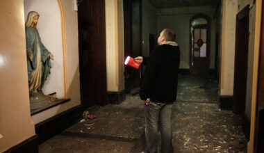 A Dublin City Council worker shines a torch in the corridor of the now derelict Sisters of Our Lady of Charity Magdalene Laundry on Sean McDermott St in Dublin’s north inner city on May 2, 2013.