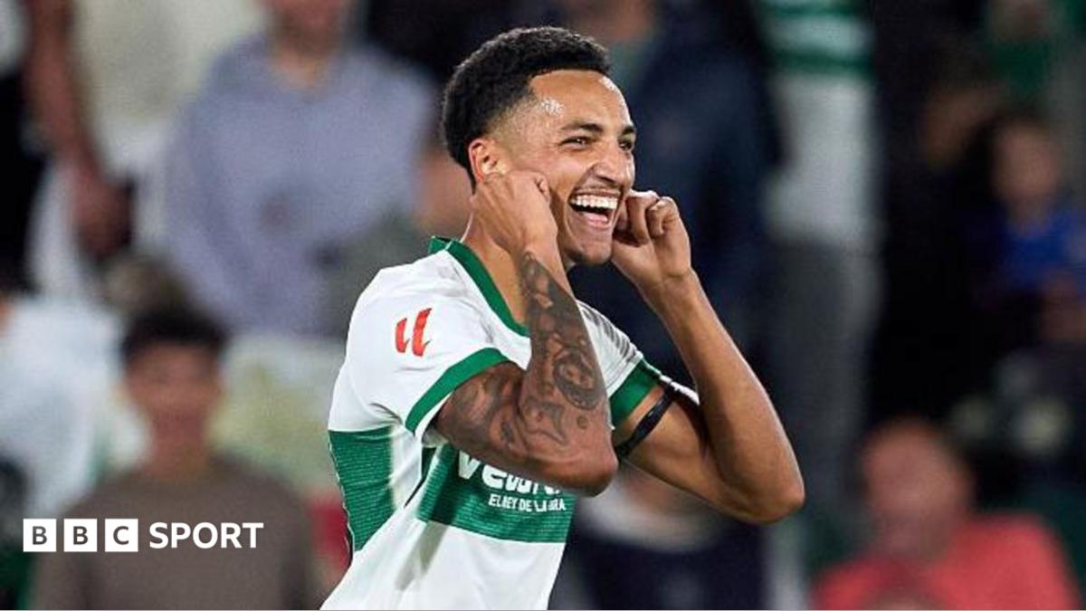 Alvaro Rodriguez pulls his ears after scoring for Elche