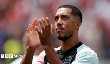 Belgium midfielder Youri Tielemans claps towards fans