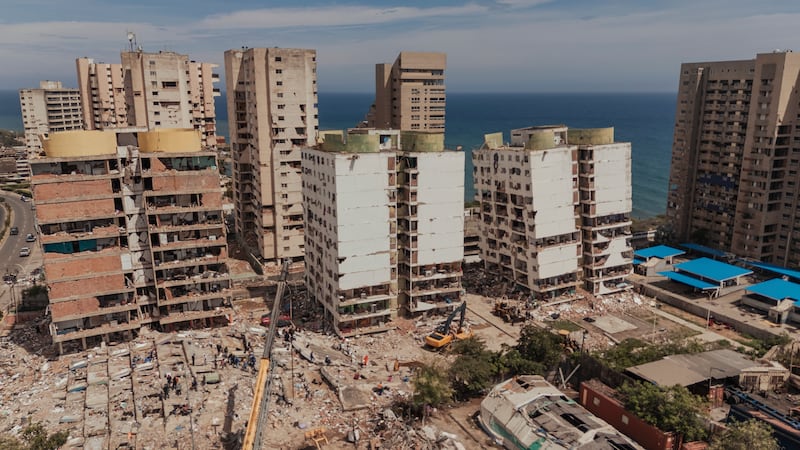 Collapsed residential buildings in the Luisa Cáceres de Arismendi public housing estate in Catia La Mar, Venezuela. Photograph: Adriana Loureiro Fernandez/The New York Times
                      