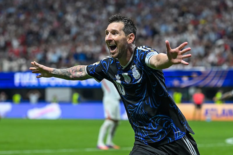 Lionel Messi of Argentina celebrates the team's second goal by Lautaro Martinez. Photograph: Shaun Botterill/Getty
