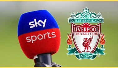 Sky Sports microphone stands next to Liverpool club crest.