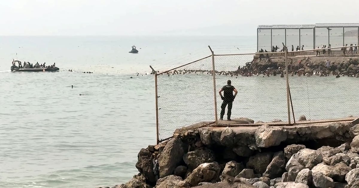 Spain sends extra troops to Ceuta after thousands of people swim into territory – The Irish Times