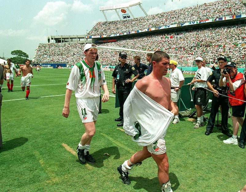 Ireland’s Roy Keane and Steve Staunton leave the pitch after the game. Photograph: Billy Stickland/Inpho