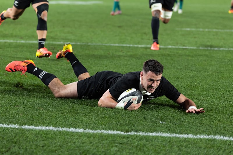 Will Jordan scores New Zealand's third try against Ireland on Saturday. Photograph: Brett Phibbs/INPHO