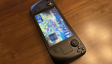 A Steam Deck sitting on a table with Civilization on the screen