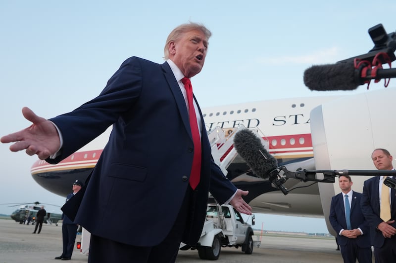 US president Donald Trump speaks to reporters as he exits Air Force One at Joint Base Andrews in Maryland, USA. Photograph: Jacquelyn Martin/AP