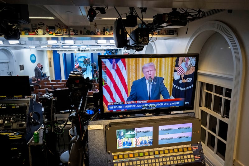 Video monitors in the White House briefing room carry a live feed of Donald Trump. Photograph: Doug Mills/The New York Times
                      