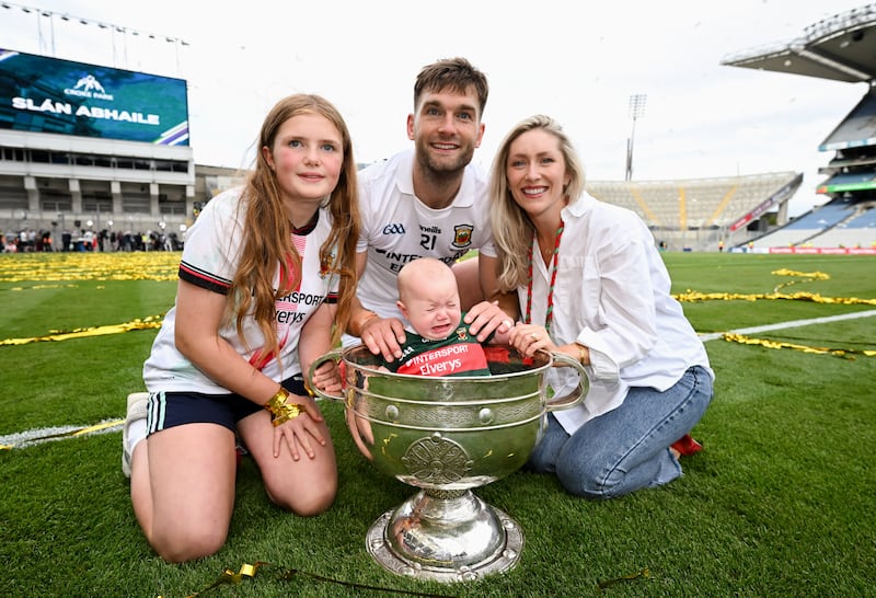 Aidan O'Shea of Mayo with his daughter Caragh, left, his wife Kristin and his daughter Romee after the GAA Football All-Ireland Senior Championship final match. Photo: Stephen McCarthy/Sportsfile via Getty Images