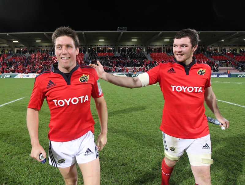 Ronan O'Gara and Peter O'Mahony in Munster colours back in 2011. Photograph: Billy Stickland/Inpho