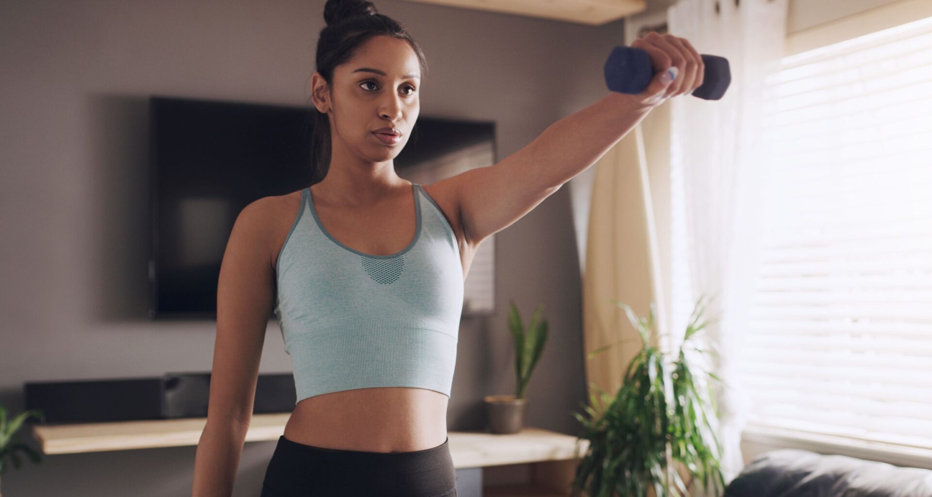 These three dumbbell moves are all you need for strong, toned arms, according to an expert trainer