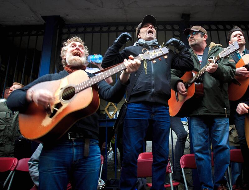 Glen Hansard and Christy Dignam performing at Apollo House on Poolbeg Street, Dublin. Photo: Gareth Chaney/Collins