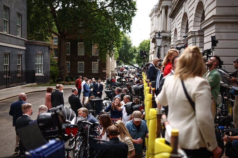 Members of the media gather outside the prime minister's residence in Downing Street prior to the departure of Britain's outgoing prime minister Keir Starmer and arrival of new prime minister Andy Burnham, in central London. Photograph: Henry Nicholls/AFP via Getty Images