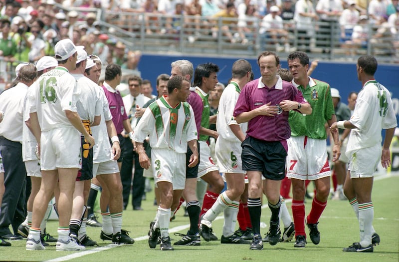 Mexico and Ireland teams take a water break during the 1994 World Cup game. Photograph: Billy Stickland/Inpho