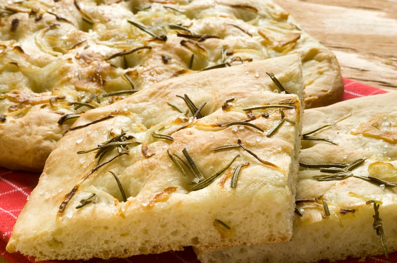 Focaccia with rosemary, onions, garlic, olive oil and sea salt.