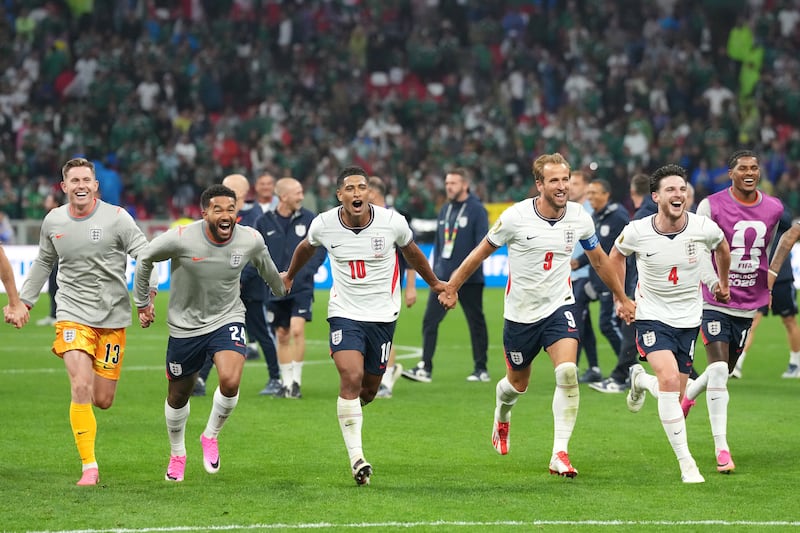 England's Harry Kane (third right), Jude Bellingham (centre left) and team-mates celebrate after their victory over Mexico. Photograph: Nick Potts/PA Wire