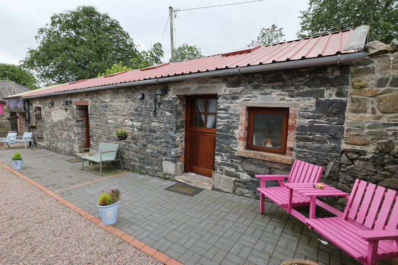The couple turned three outhouses into self-catering cottages