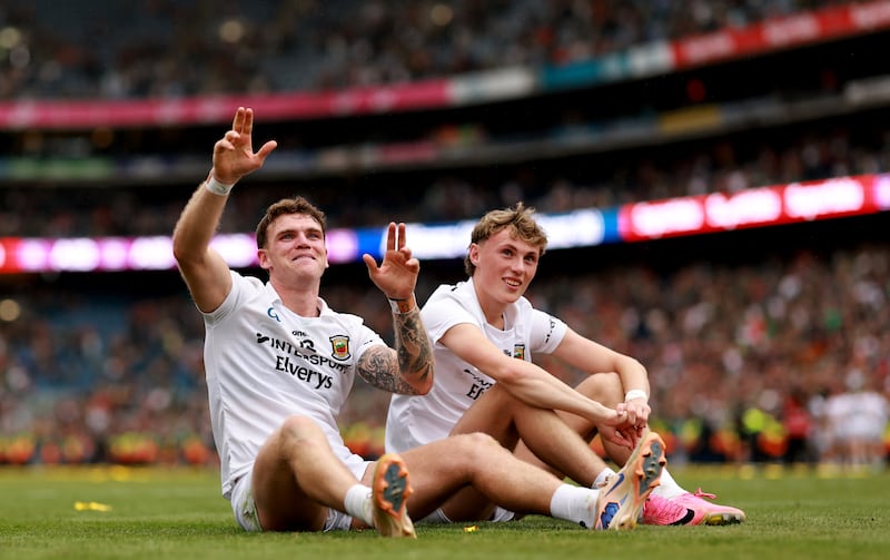 Mayo's Jordan Flynn and Kobe McDonald take in the atmosphere in Croke Park after the All-Ireland final win. Photograph: James Crombie/Inpho