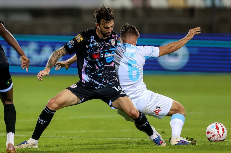 Rijeka's Branko Pavić is tackled by Derry's Ellis Chapman. Photograph: Aleksandar Djorovic/Inpho
