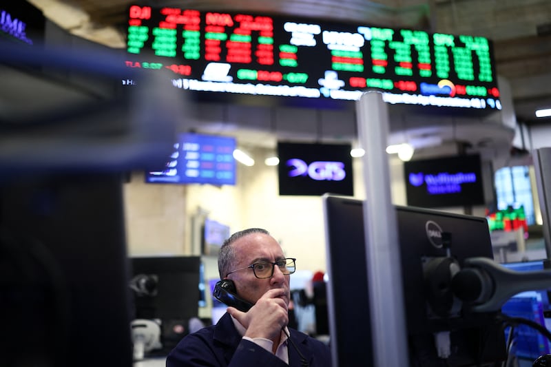 A trader at work at the New York Stock Exchange. 'You have to be willing to endure the one year in three that the stock market goes down globally,' says David Gardner. Photograph: Charly Triballeau/AFP/Getty 