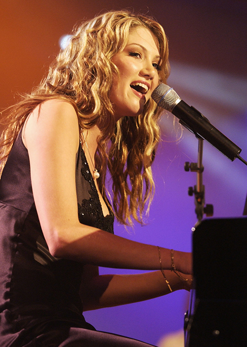 MELBOURNE - JANUARY 28:  Delta Goodrem performs during the presentation of the Allan Border Medal at the Crown Palladium Ballroom in Melbourne, Australia on January 28, 2003. The Allan Border Medal is awarded to Australia's best cricketer over the last 12 months in Tests and One-Day Internationals. (Photo by Robert Cianflone/Getty Images)
