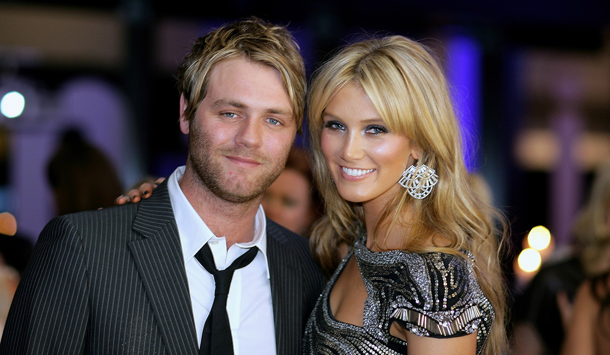 SYDNEY, AUSTRALIA - MAY 20:Singers Brian McFadden and Delta Goodrem attend the Madison Sex, Frocks & Rock'N'Roll dinner to celebrate and award excellence in Fashion, Music and Style at the Apple building on May 20, 2009 in Sydney, Australia.  (Photo by Mike Flokis/Getty Images)