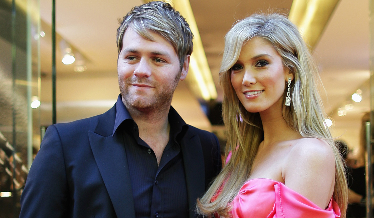 MELBOURNE, AUSTRALIA - JANUARY 14:  Brian McFadden (L) and Delta Goodrem arrive for the official opening of TAG Heuer's first Melbourne boutique at Collins Street on January 14, 2010 in Melbourne, Australia.  (Photo by Mark Dadswell/Getty Images)