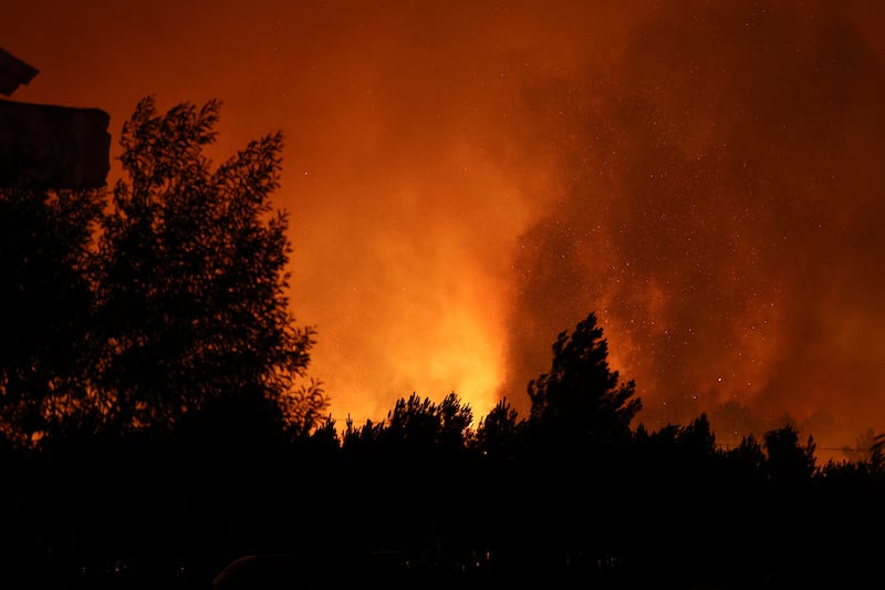A wildfire rages through a forestry area in Le Porge, southwestern France early. Photograph: Romain Perrocheau/AFP via Getty Images