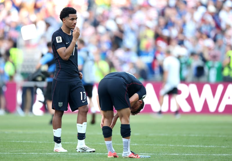 Malik Tillman (L) of USA and teammates after their loss to Belgium in Seattle. Photograph: EPA