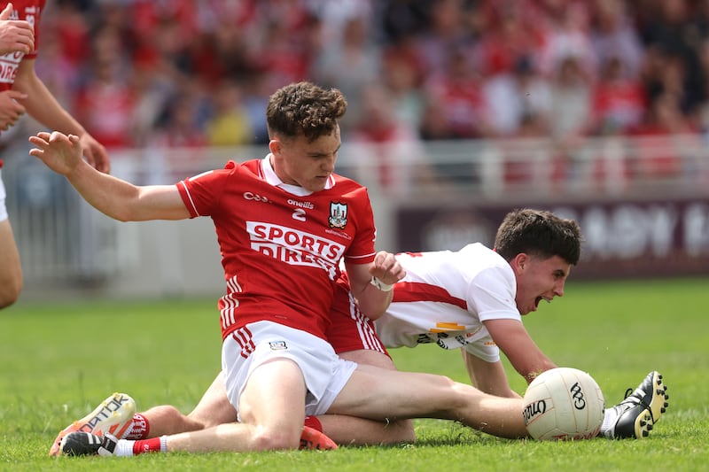 Cork's Riain McCormack and Aidan Farley of Tyrone. Photograph: Bryan Keane/INPHO